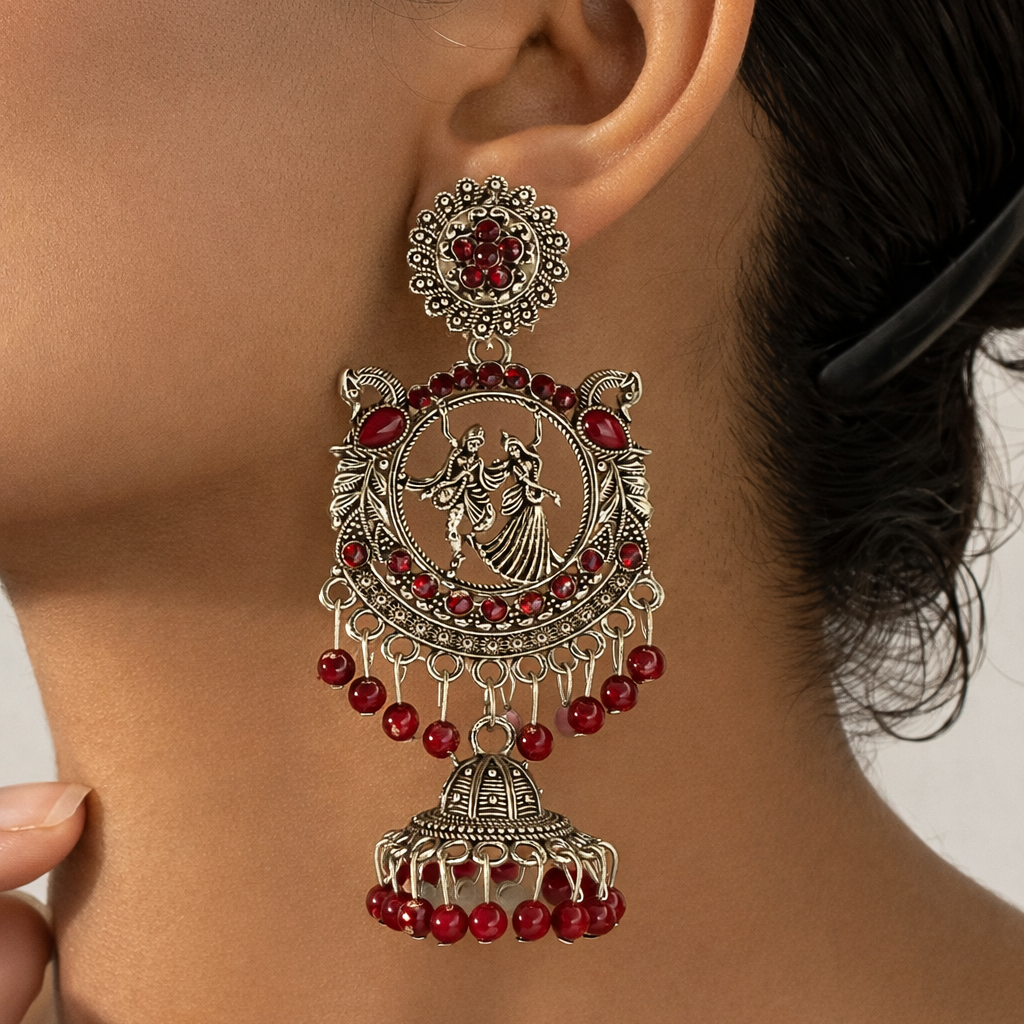 Radha Krishna Oxidised Silver Jhumka Earrings with Rich Maroon Beads