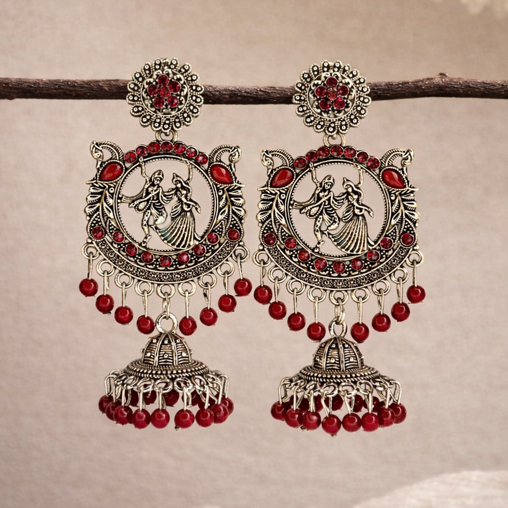 Radha Krishna Oxidised Silver Jhumka Earrings with Rich Maroon Beads
