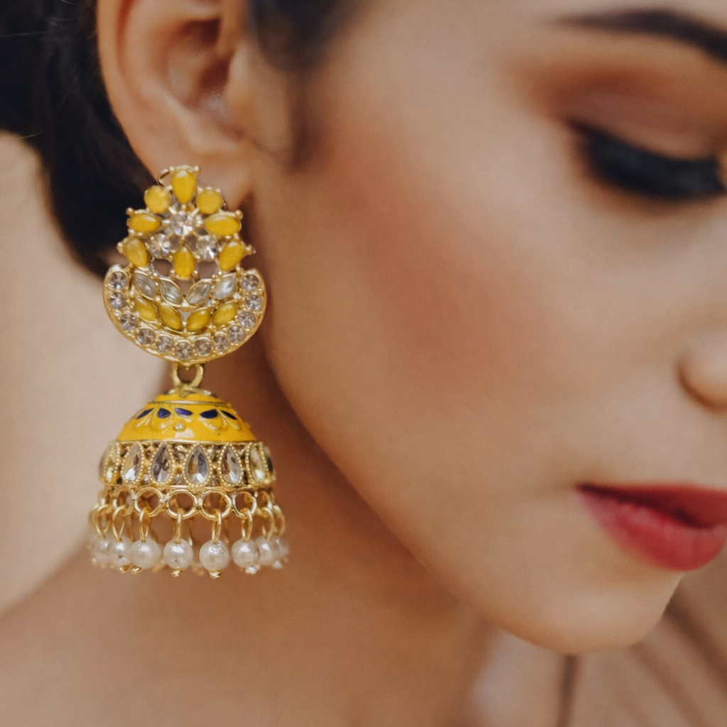 Yellow Kundan Pearl Jhumka Earrings in Gold Finish